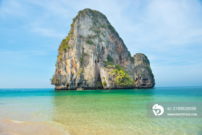 Thailand landscape with tropical sea near sand beach and rock island on foreground and at horizon