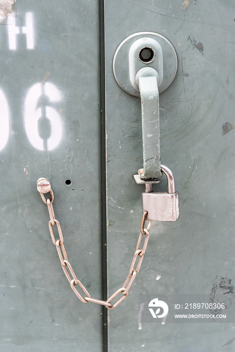 Close up key of rusted old lockers.