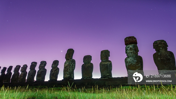 Dawn, stars and Moai statues of Ahu Tongariki on Easter Island