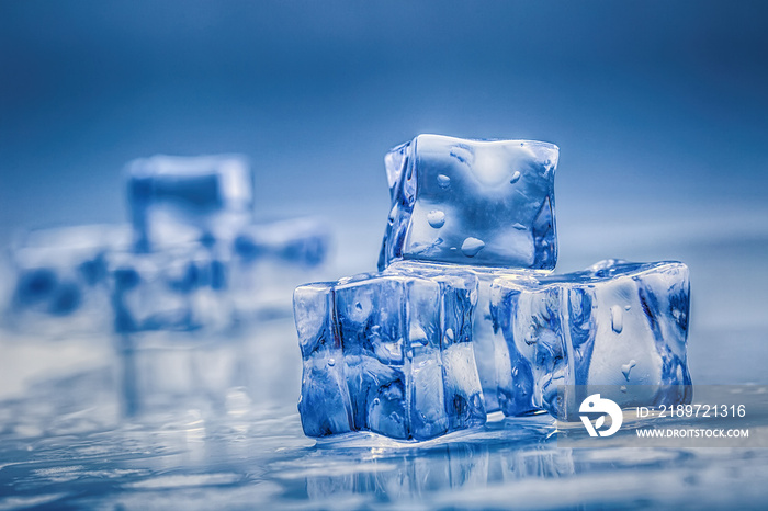 ice cubes on blue background.