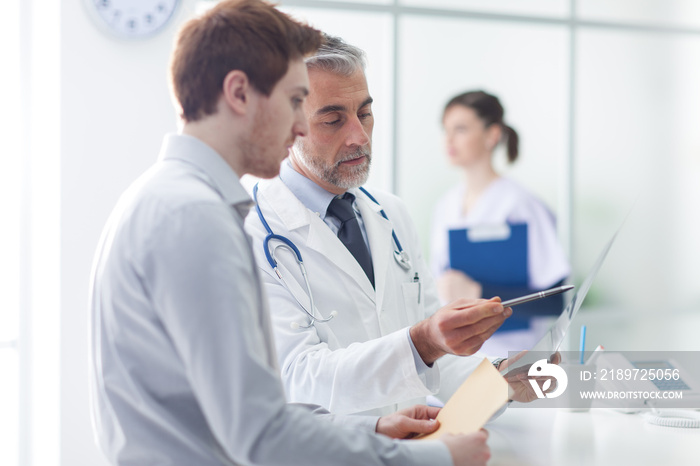 Doctor examining a patients x-ray