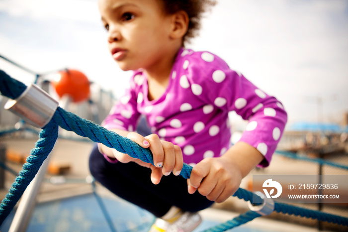 Portrait of girl (2-3) in playground