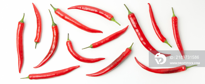 Flat lay with chilli peppers isolated on white background