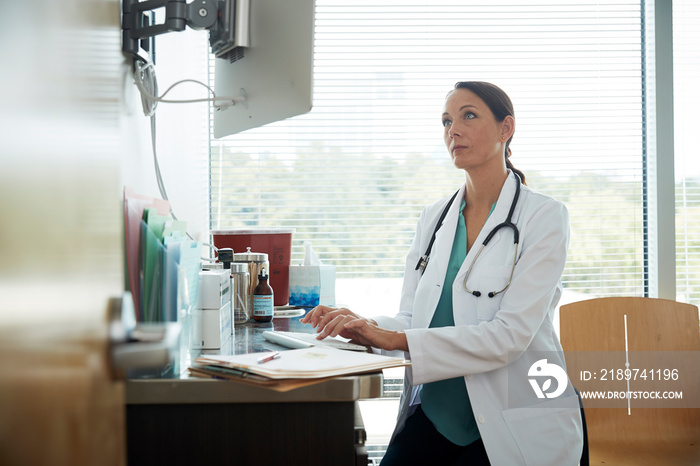 Doctor working on computer