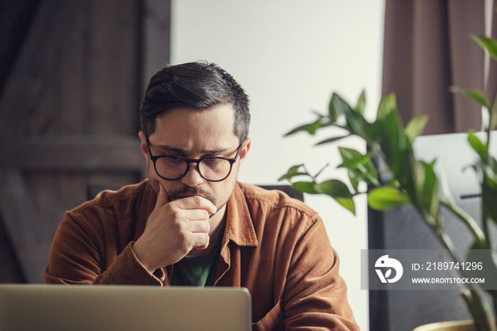 man working with computer from home during a pandemic