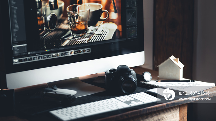 Home office desk,Computers and cameras on the desk