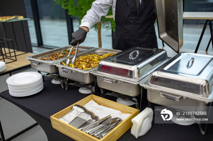 banquet table with chafing dish heaters At the restaurant