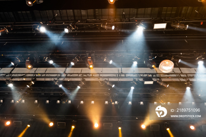 Performance moving lighting luminous rays on construction rack light beam ray downward in white red 