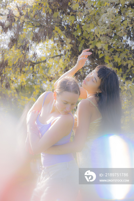 women in nature dancing