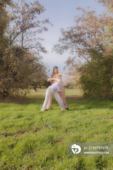 women in nature dancing