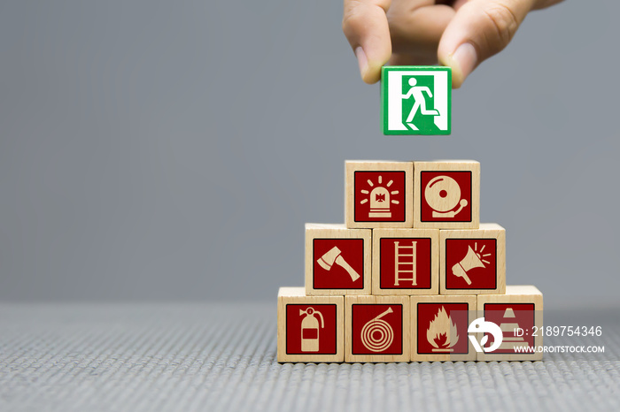 Wood block Stacking with Fire and safety icons.