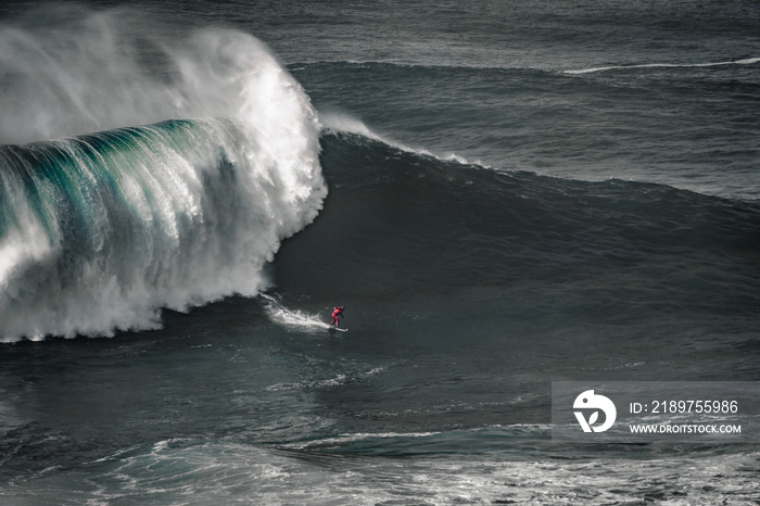 Big wave surfing Praia do Norte Nazaré Portugal