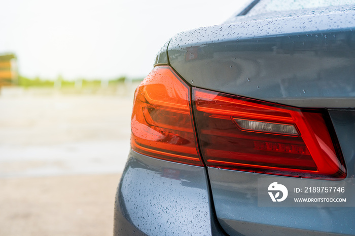 Rear light of the modern luxury vehicle close up.