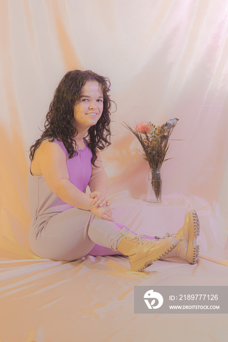 Woman posing with flowers