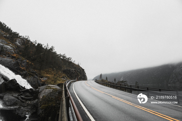 View of highway road in a misty mountain