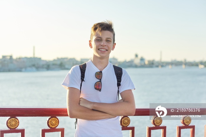 Portrait of stylish smiling teenage boy of 15 years old