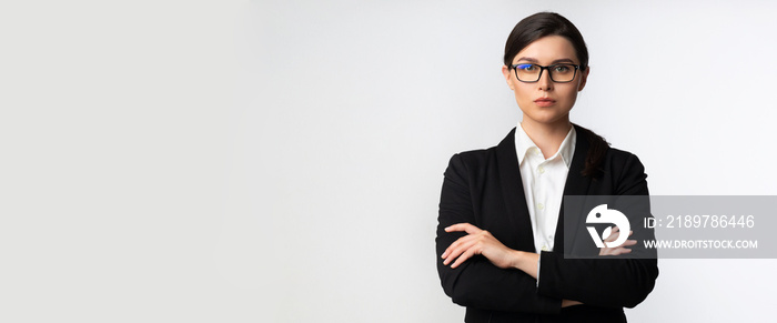 Serious Business Lady Looking At Camera Standing In Studio, Panorama