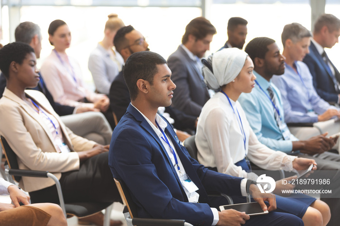 business people attending a business seminar