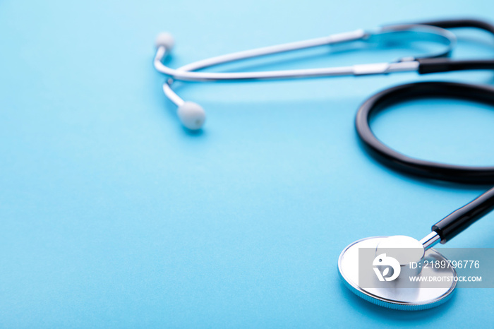 Medical stethoscope on a blue background. Health care concept