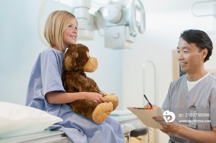 Young female patient with her stuffed animal