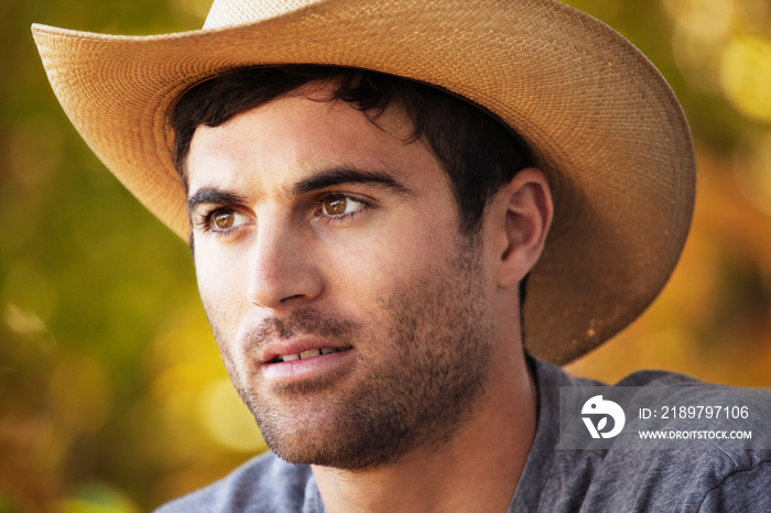Portrait of man wearing cowboy hat