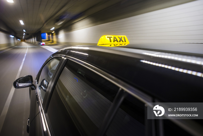 Taxicab with the roof light illuminated