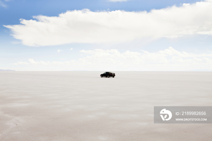 Car Driving on the Utah Salt Flats