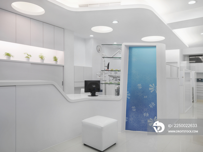 Modern white reception area of dental hospital