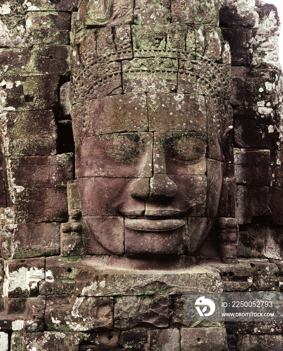 A face-tower on the upper terrace of the Bayon late 12th centuy Angkor, Cambodia