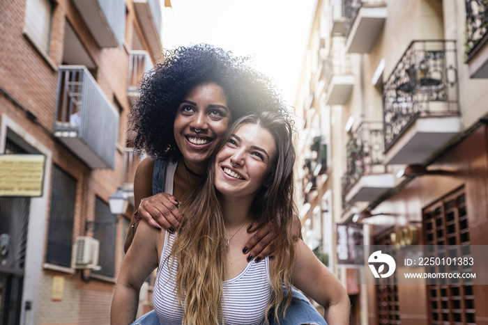 Beautiful women having fun in the street.