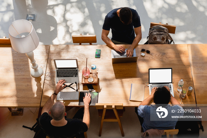 Top view group of multiethnic people working in an office.