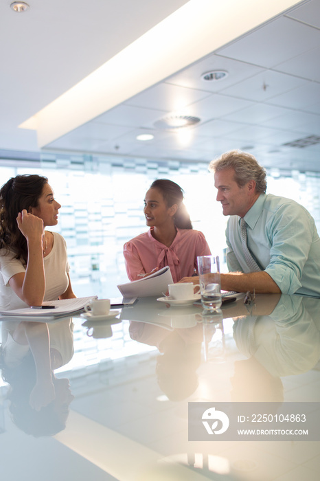 Business people talking in office meeting