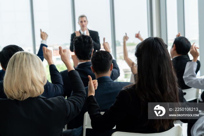 Group of business people meeting in a seminar conference . Audience listening to instructor in emplo