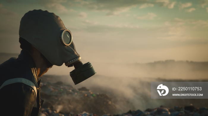 Man in gas mask in outdoors. Stop Environmental Pollution