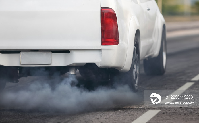 air pollution crisis in city from diesel vehicle exhaust pipe on road