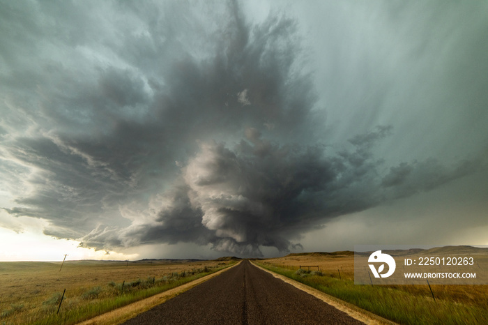 Incredible supercell spinning across Wyoming, sky full of dark storm clouds