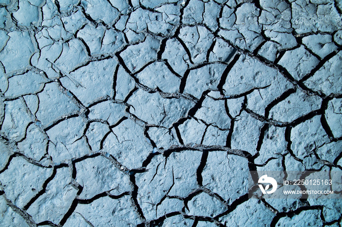 ICE BLUE PATCH OF LAND OF DRY GROUND SHOT FROM ABOVE