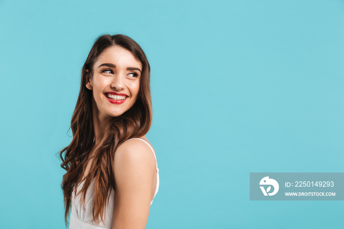 Portrait of a happy young girl in summer dress