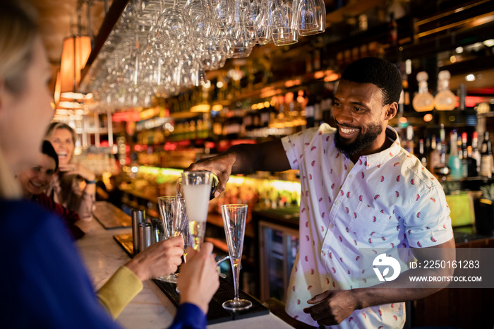 Bartender Pouring a Glass of Prosecco