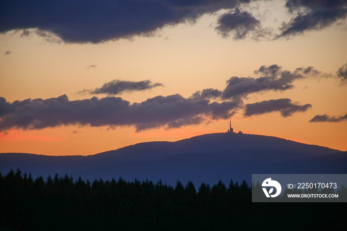 Brocken mountain silhouette at sunset
