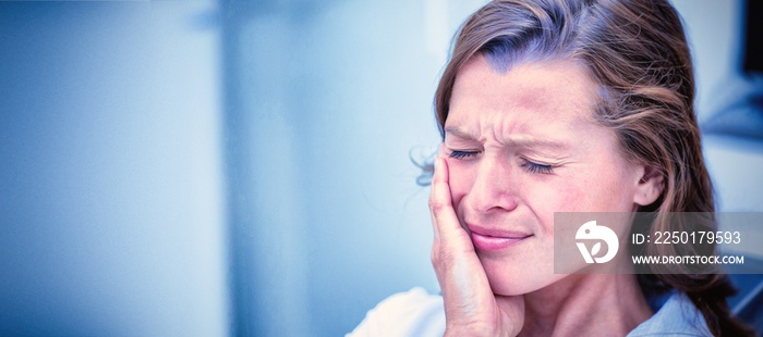 Unhappy woman having a toothache