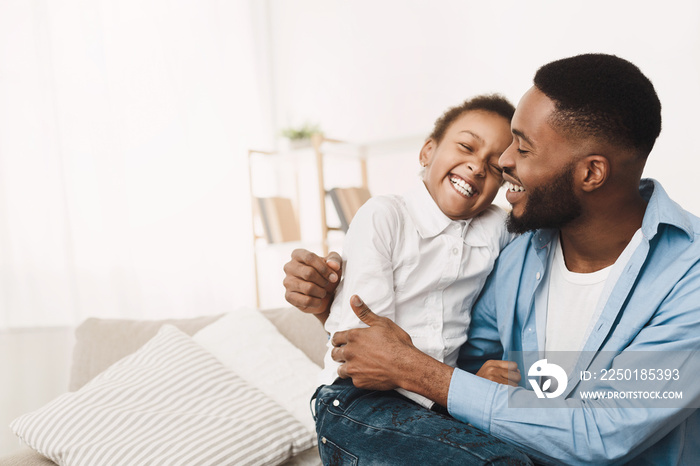 Afro Father Tickling Daughter, Having Fun And Playing At Home