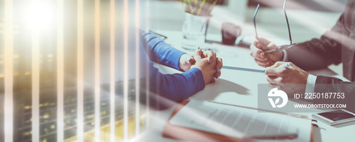 Business negotiation between businesswoman and businessman; multiple exposure