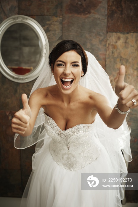 Happy bride thumbs up