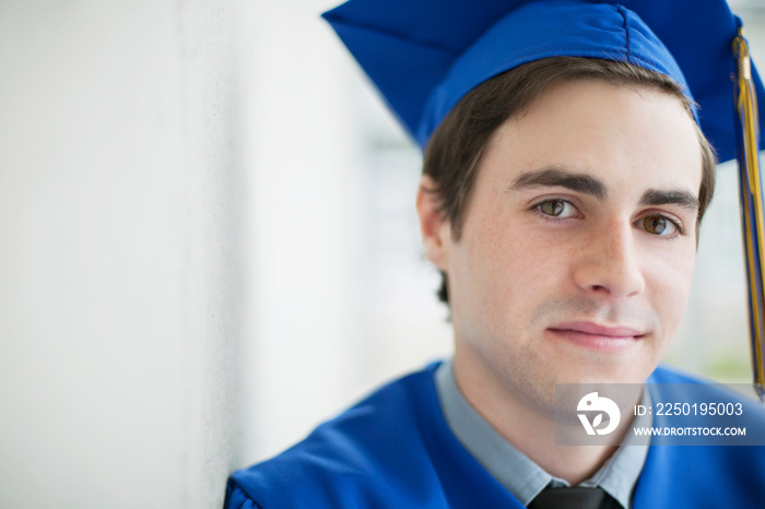 portrait of graduate in cap and gown