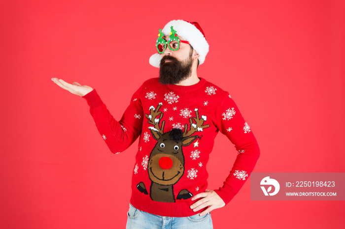 Sweater with deer. Clothes shop. Buy festive clothing. Holidays accessories. Hipster bearded man wea