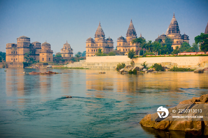 View of Royal cenotaphs (Chhatris) of Orchha over Betwa river. Orchha, Madhya Pradesh, India, Asia.