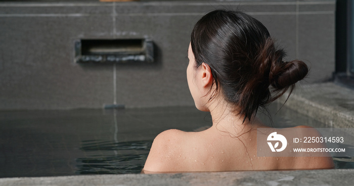 Woman enjoy Japanese onsen