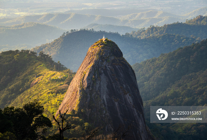 Spectacular view of Doi Nork an iconic huge grey black rock in Doi Luang national park in Phayao pro