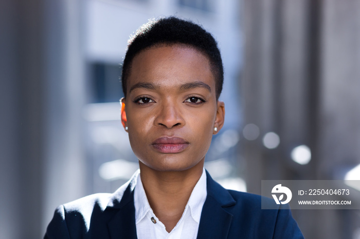 Headshot photo with close up portrait of serious businesswoman, african american woman confident and